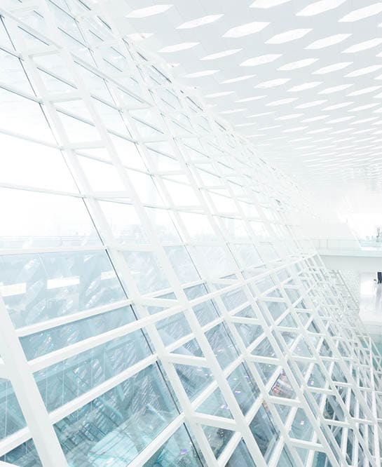 Abstract architectural wall of glass and steel in modern office