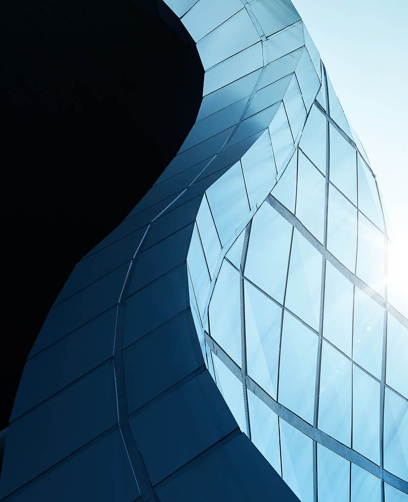 Modern architecture business building abstract curve line details steel facade background .